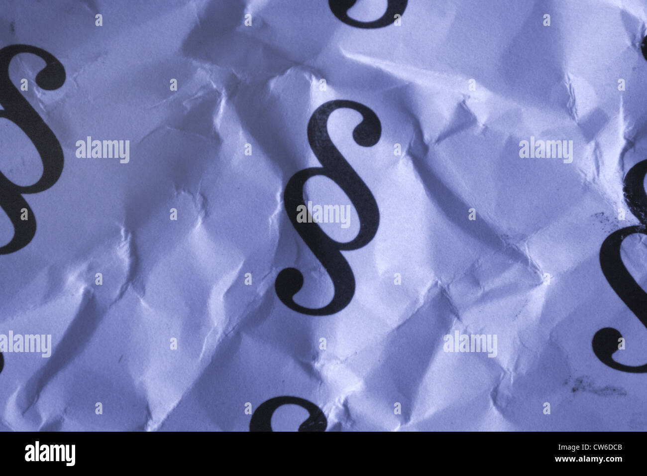 paragraph signs on creasy paper Stock Photo