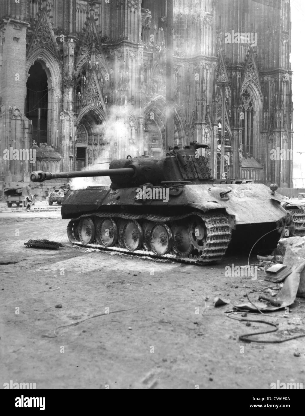 Deserted German tank stands before Cologne cathedral, March 6, 1945