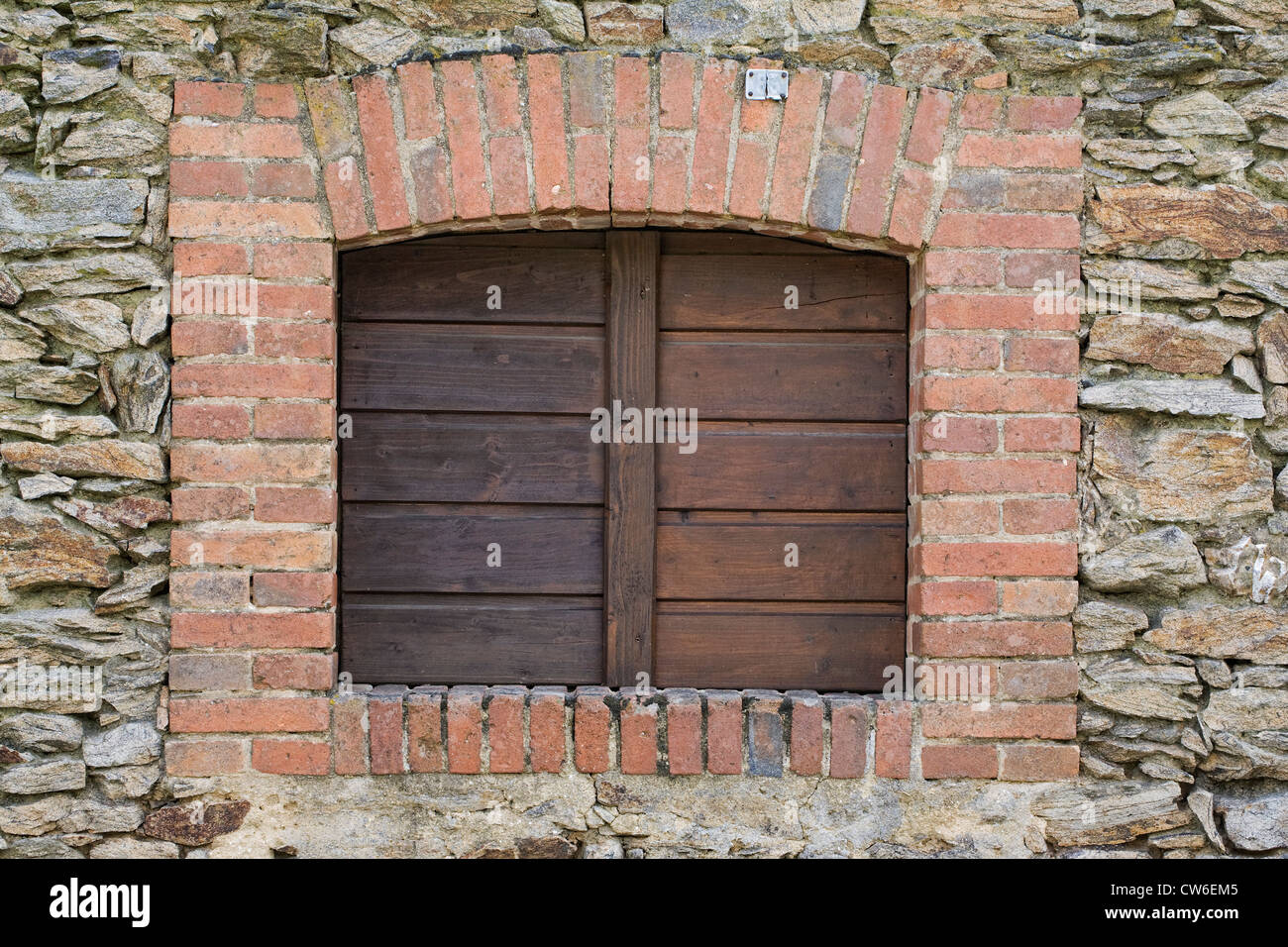 French barn window with wooden shutters. Stock Photo