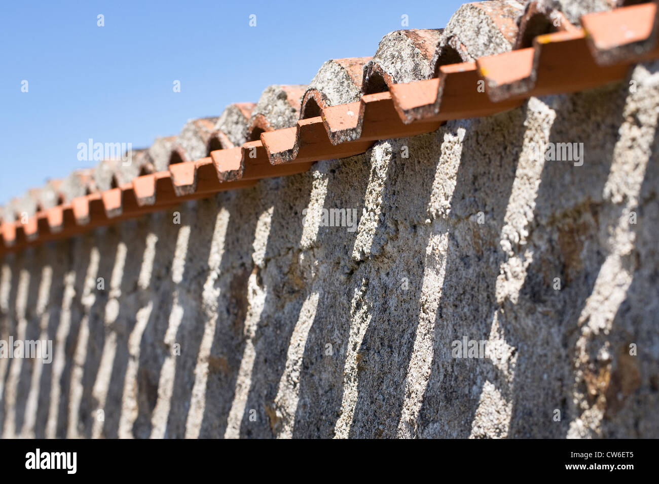 Shadow pattern made by French roof tiles. Stock Photo
