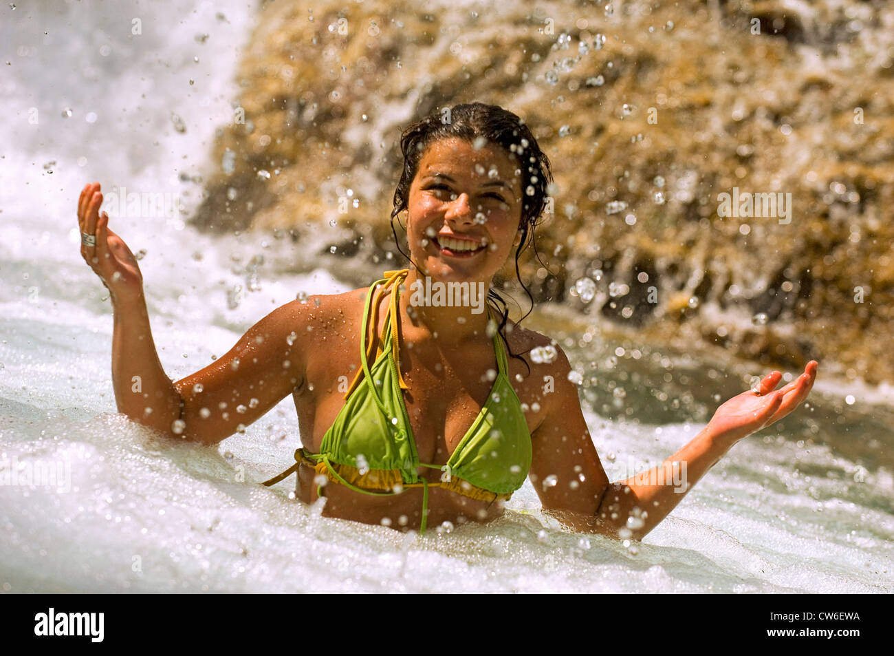 girl having fun in a mountain lake Stock Photo