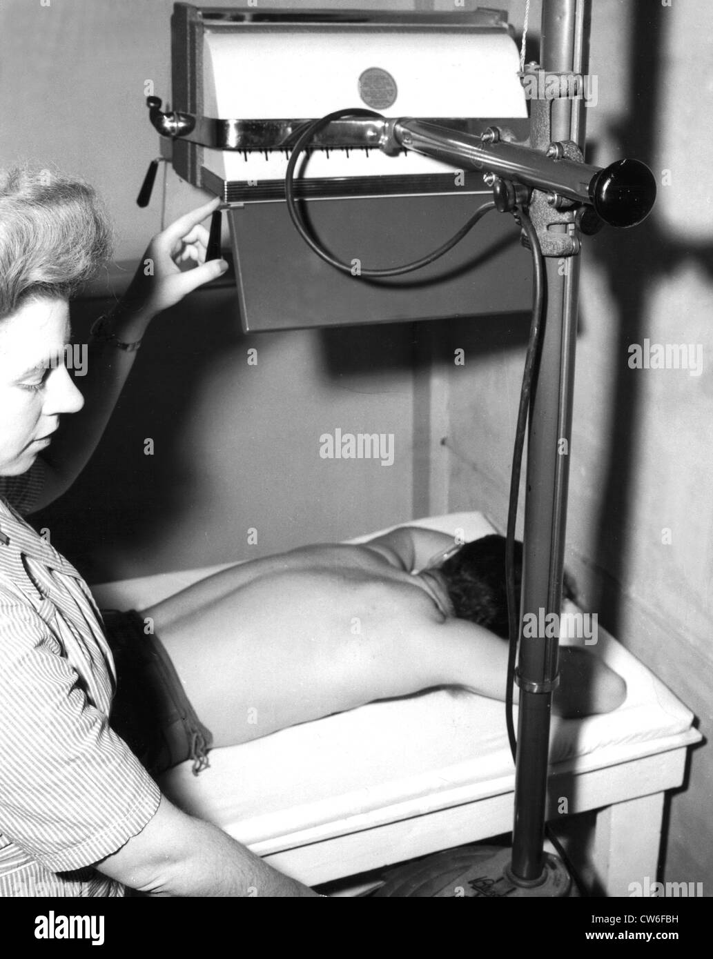 Ultra-violet sun lamp is used at a station hospital in Marseilles, February 6, 1945 Stock Photo