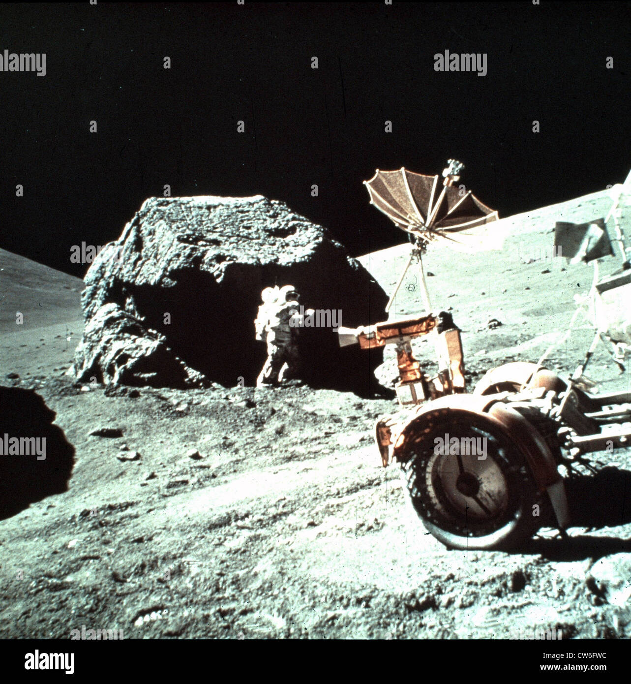 An Astronaut of Apollo 17 collects lunar rake samples on Moon ...