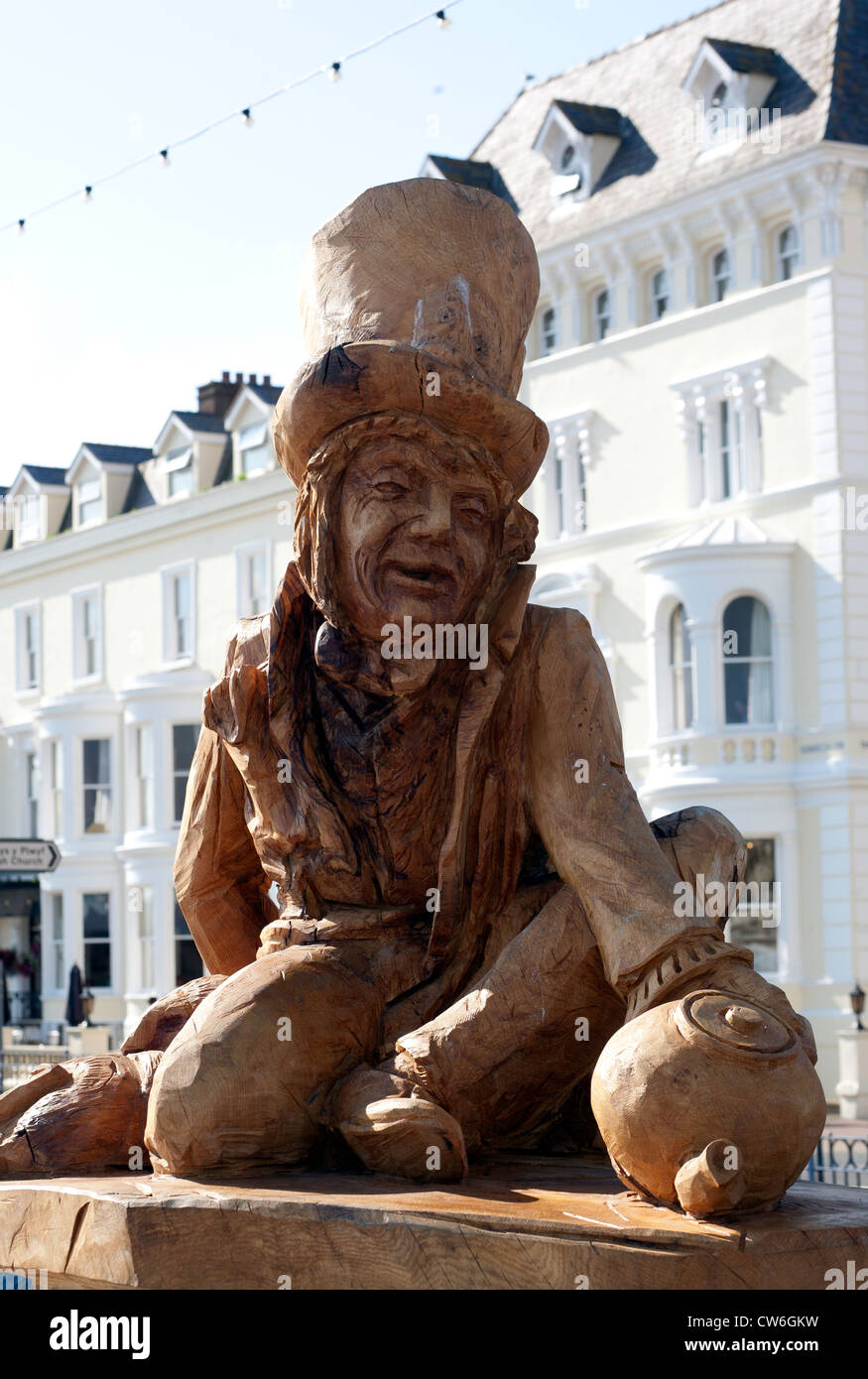 Wooden sculpture of 'The Mad Hatter' from Alice in Wonderland on Llandudno Promenade. Pic Colin Paxton/CP Photography Stock Photo