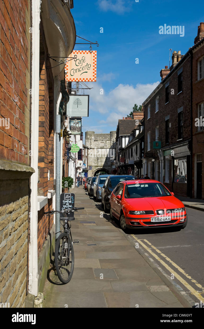 Cars parked in the city town centre in summer High Petergate York North Yorkshire England UK United Kingdom GB Great Britain Stock Photo