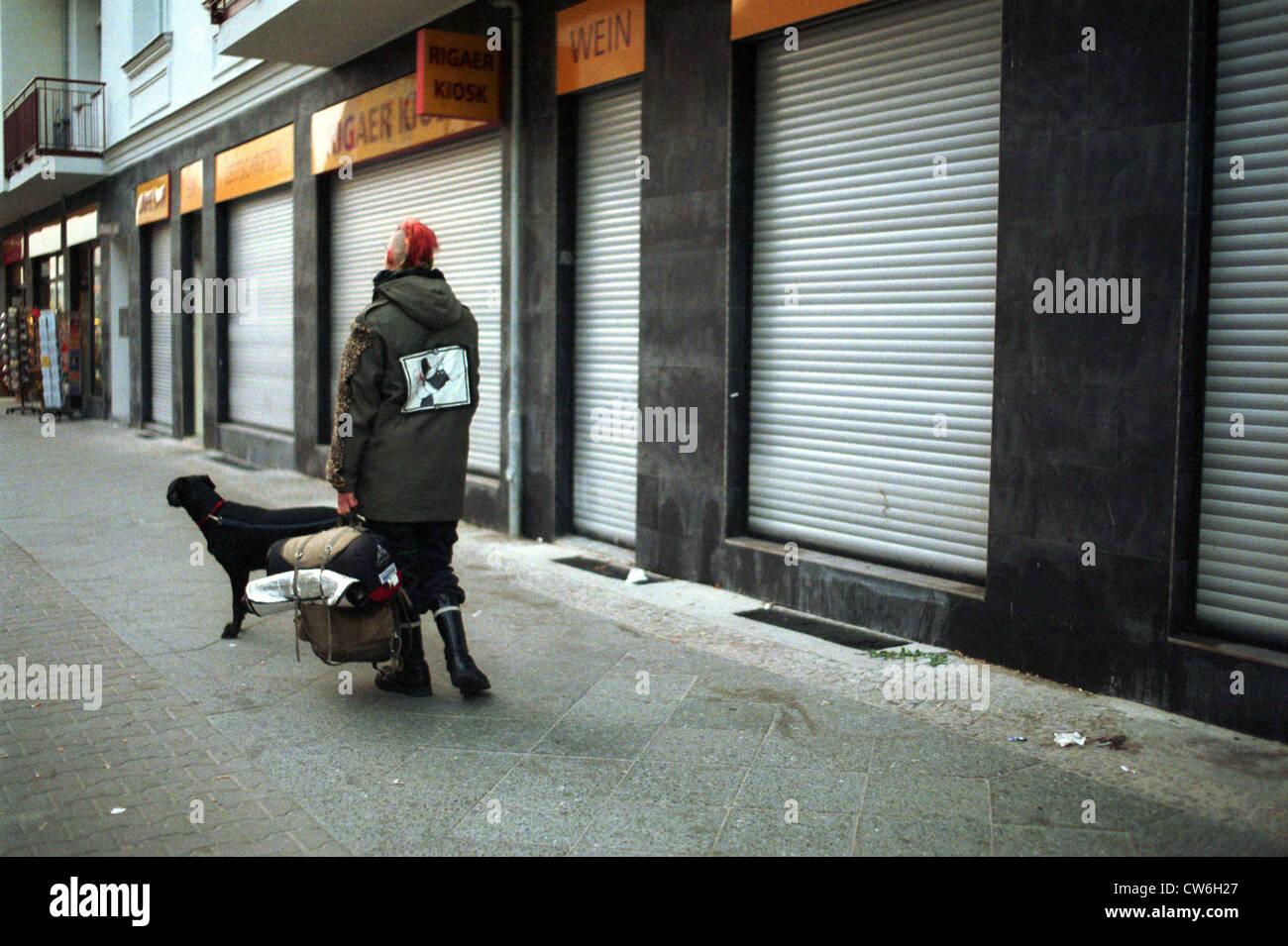 Berlin, a street child with dog Stock Photo Alamy
