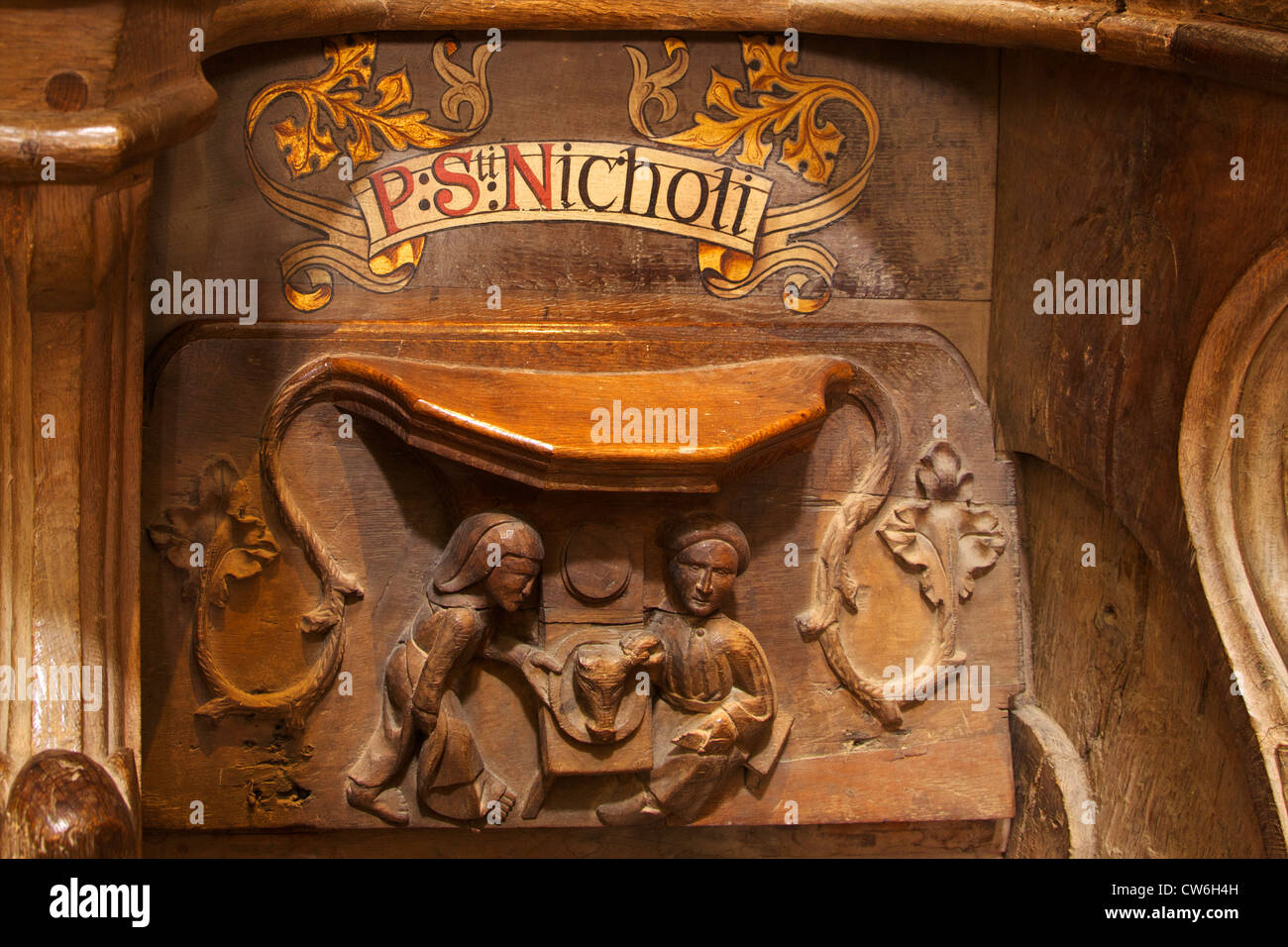 The meal misericord, St Davids Cathedral interior,   Pembrokeshire National Park, Wales, Cymru, United Kingdom, UK, GB Stock Photo