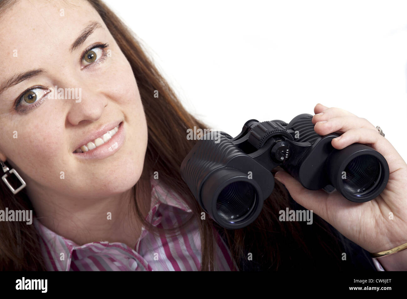 young businesswoman holding binoculars in hand Stock Photo