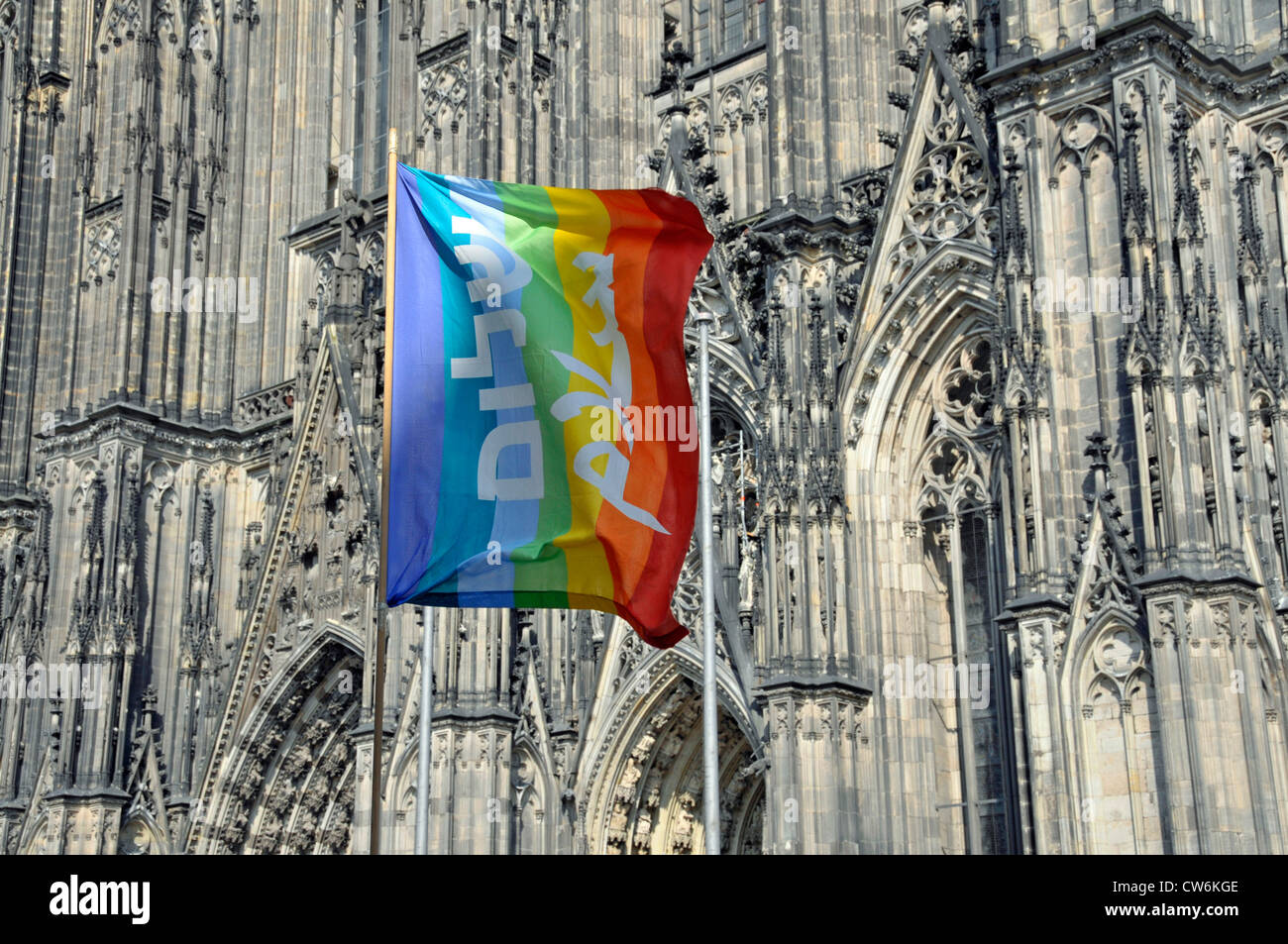 peace flag in front of Cologne cathedral, Germany, North Rhine-Westphalia, Cologne Stock Photo