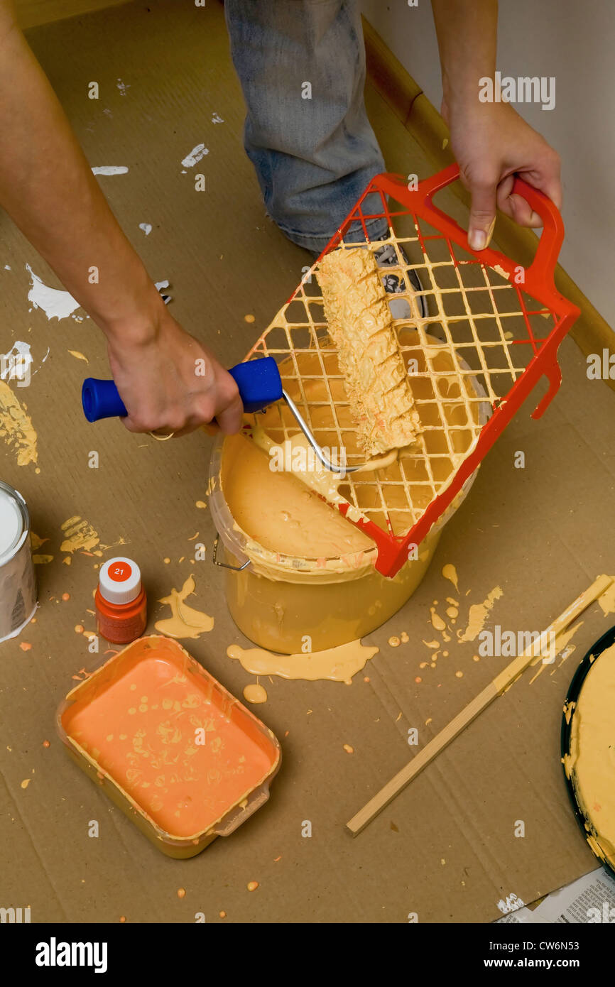 Bucket of orange paint hi-res stock photography and images - Alamy