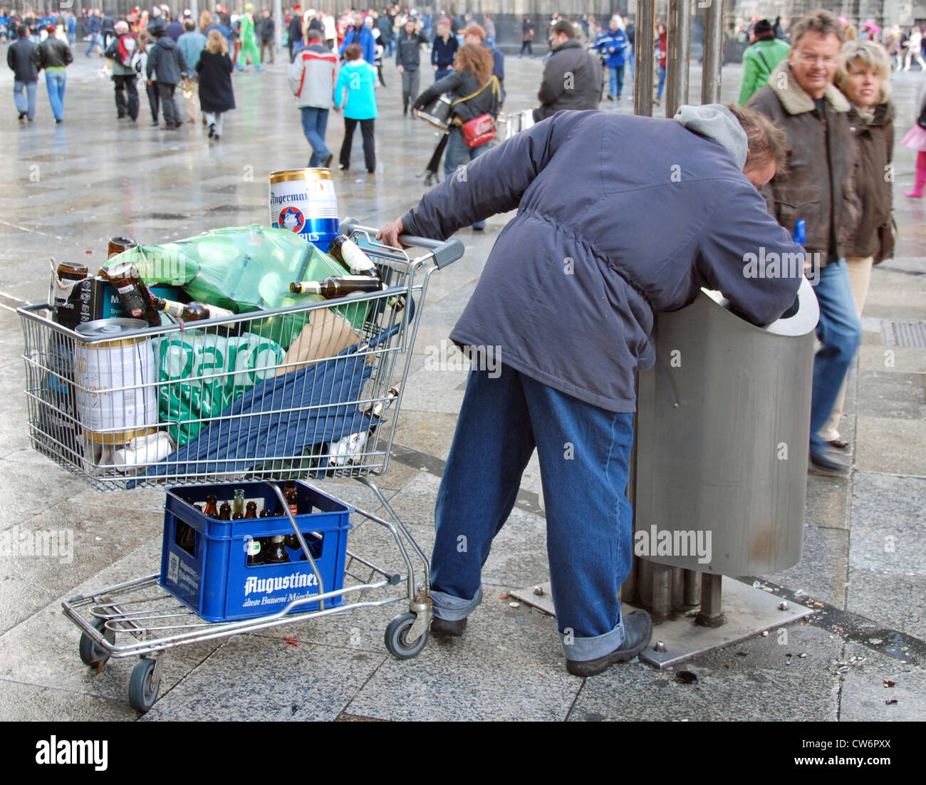 man looking for deposit bottles, Germany Stock Photo