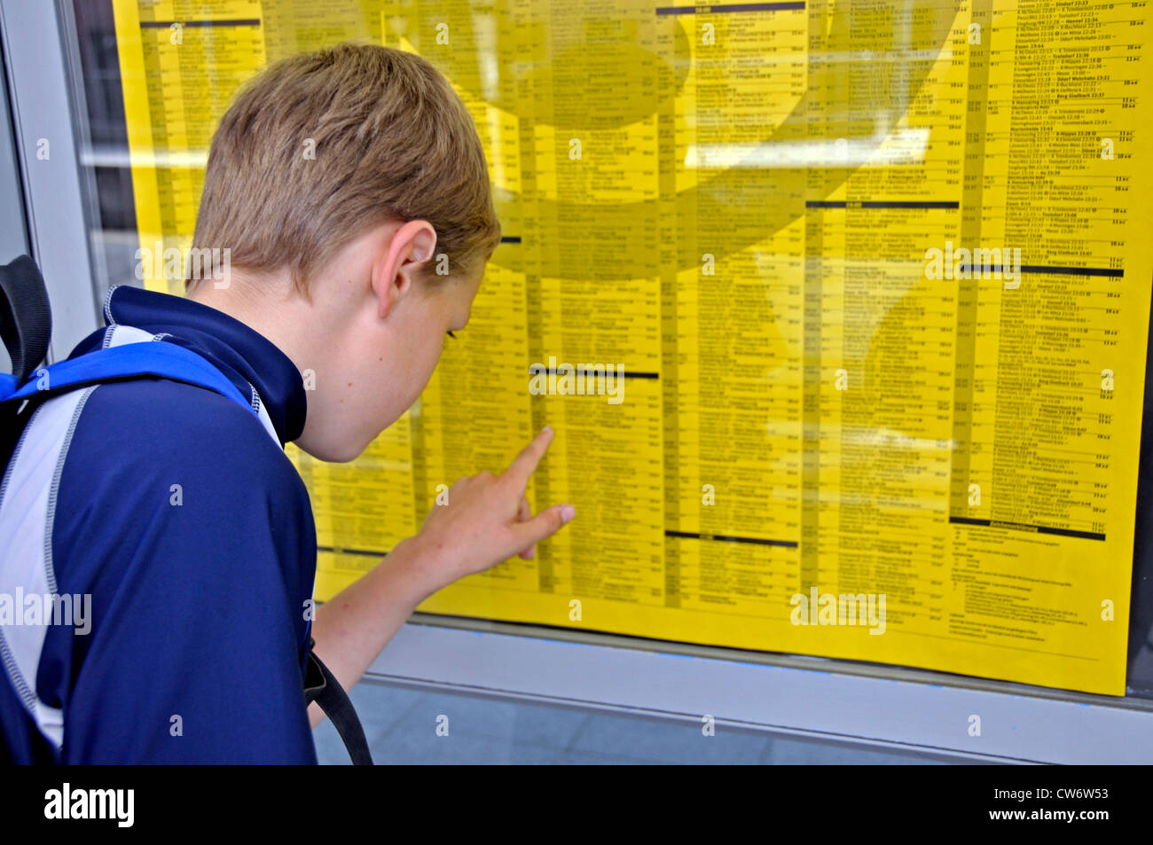 nine years old boy at a time table, Germany, North Rhine-Westphalia, Cologne Stock Photo