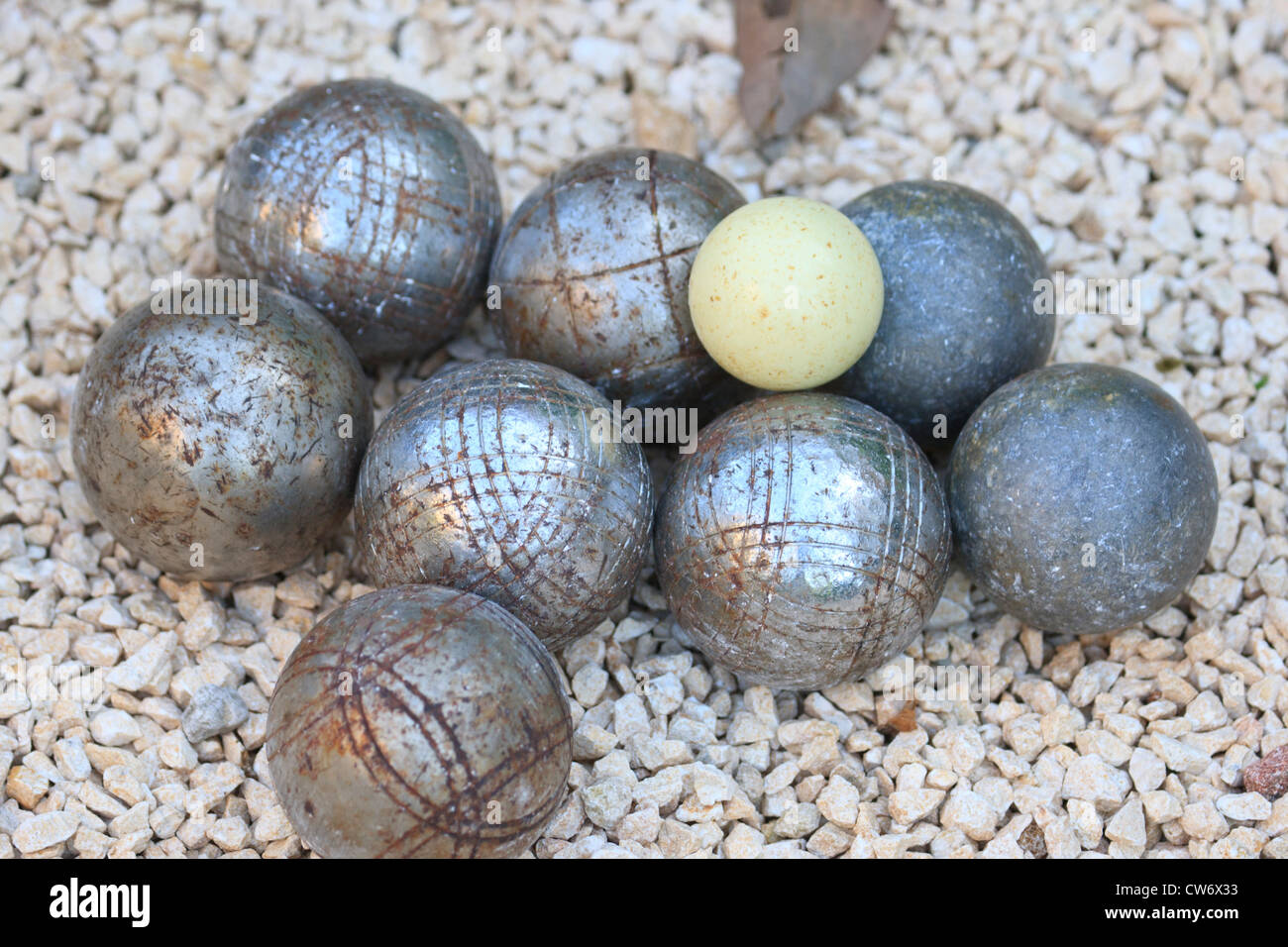 Boule and jack on gravel Stock Photo
