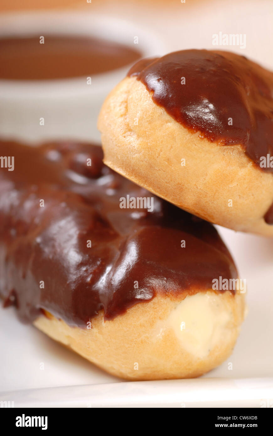 Two delicious homemade eclairs with a chocolate ganache Stock Photo