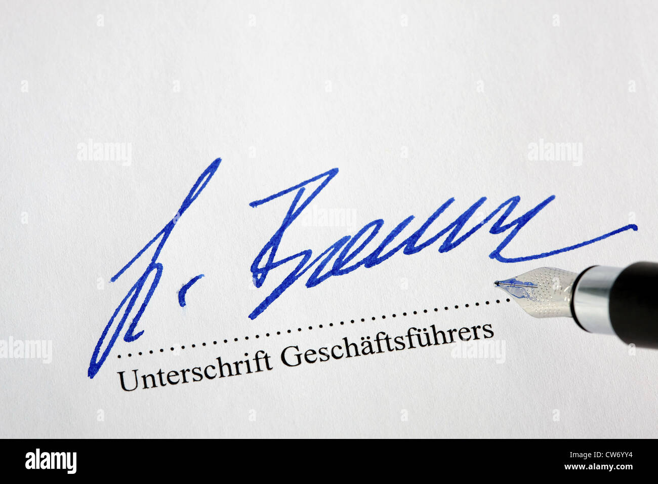 Signature of the manager below a new order Stock Photo