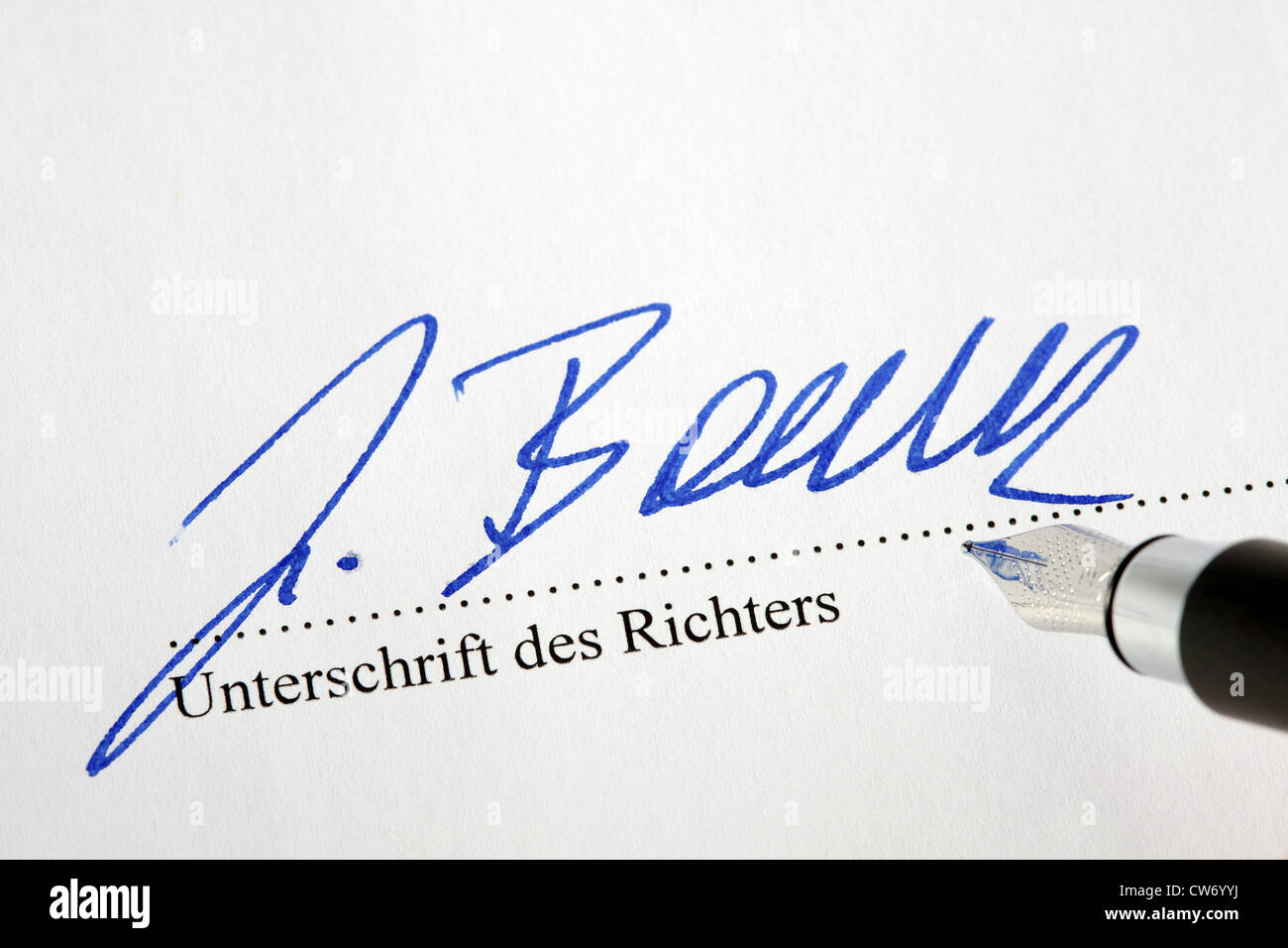 Handwritten signature of a judge at a court ruling Stock Photo