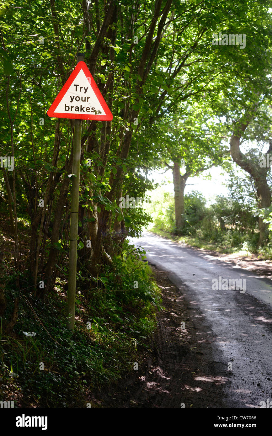 try your brakes warning sign after ford running across road Bardsey Yorkshire UK Stock Photo