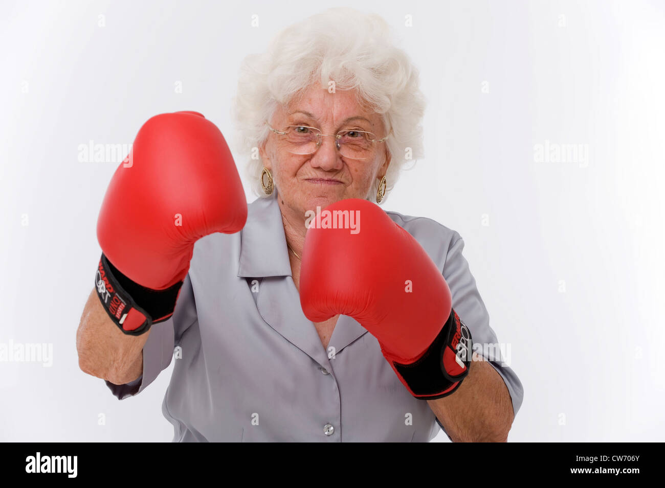 old woman wih boxing gloves Stock Photo - Alamy