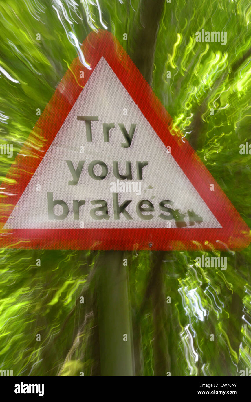 try your brakes warning sign after ford running across road Bardsey Yorkshire UK Stock Photo