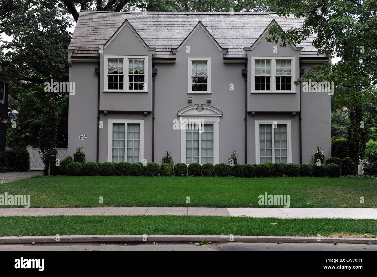 Stucco house with green lawn. New Haven, CT. Stock Photo