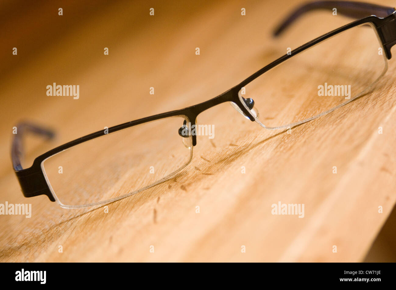 https://c8.alamy.com/comp/CW71JE/thin-rimmed-small-glasses-spectacles-frame-black-look-looking-intellectual-CW71JE.jpg