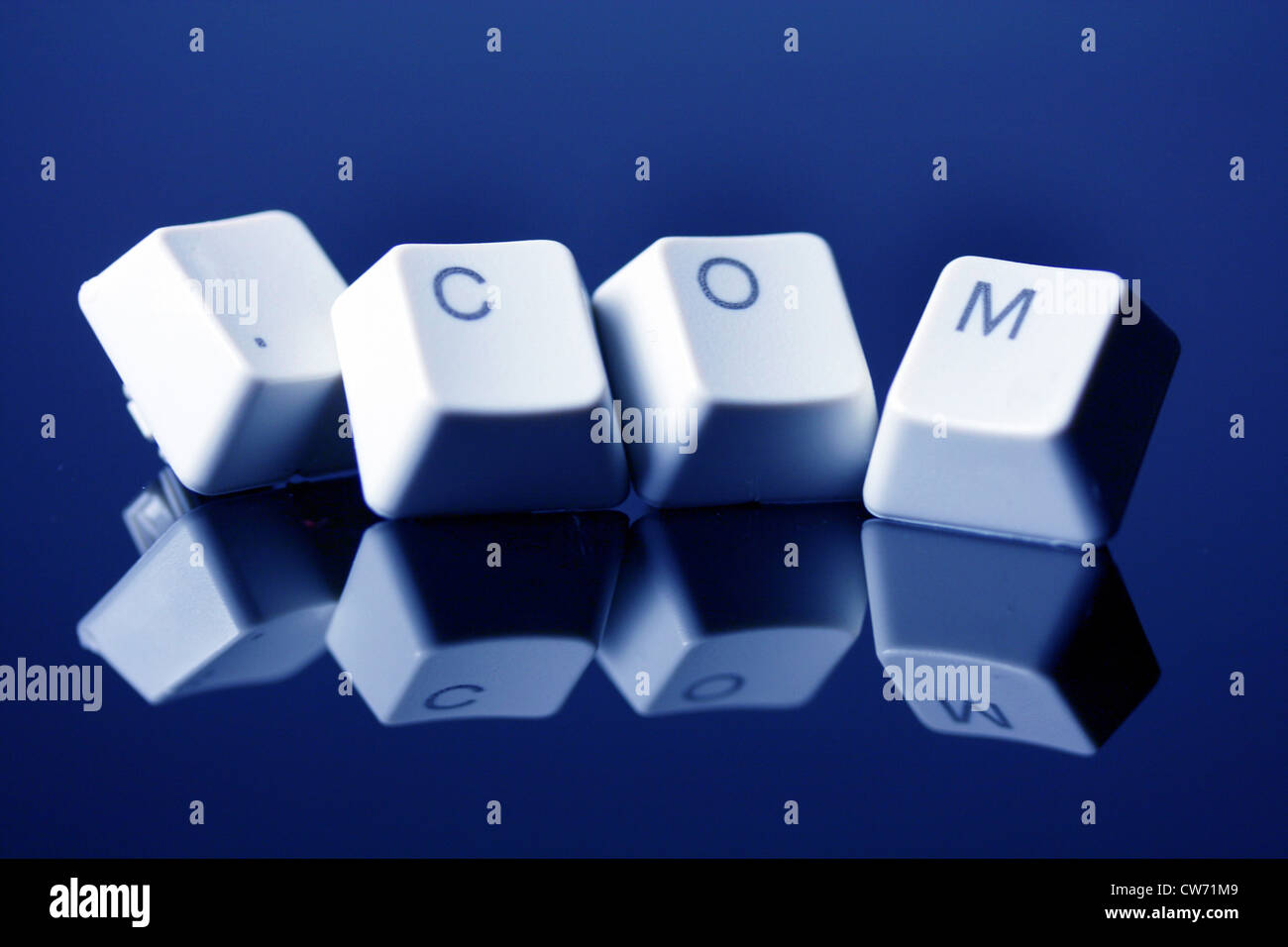 four computer keys adding up to the internet domain '.com' Stock Photo