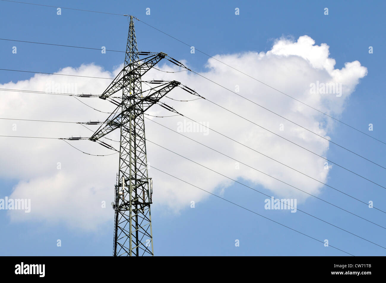 power pole with cloudy sky, Germany Stock Photo