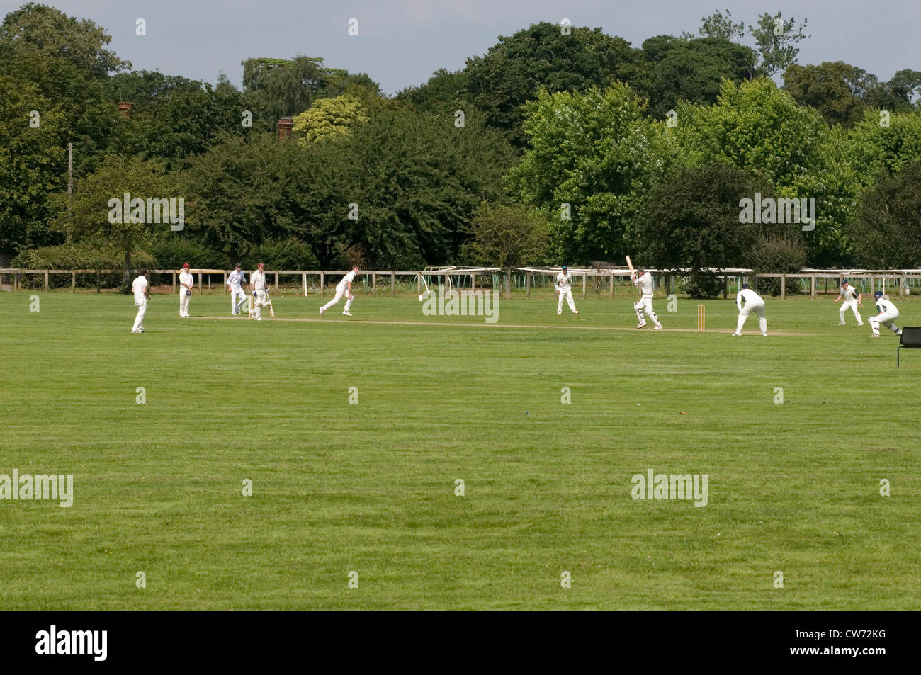 Team players bat stumps pitch ball hires stock photography and images