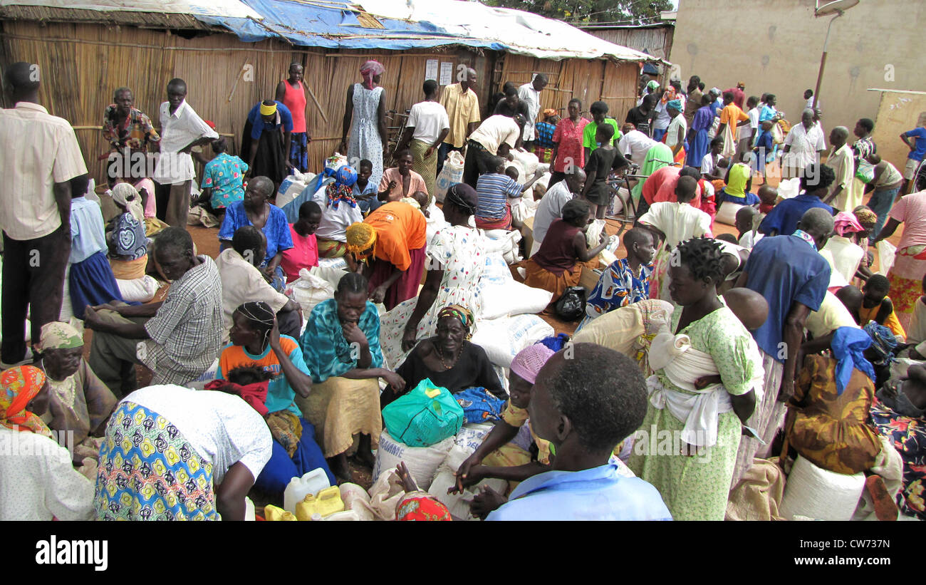 refugee camp for internally displaced people in northern Uganda around Gulu, the non-governmental organisation 'Norwegian Refugee Council' is distributing food rations for the UN World Food Programme for elderly and hancicapped people, bags with mais and , Uganda, Gulu, Gulu Stock Photo