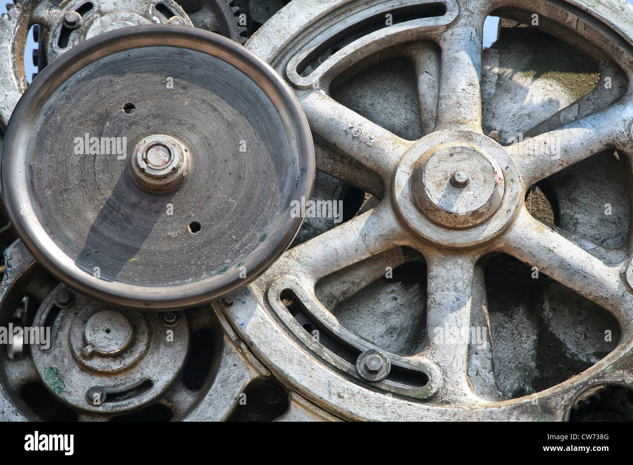 Detail of of an old grungy piece of industrial machinery used in a manufacturing process. Stock Photo