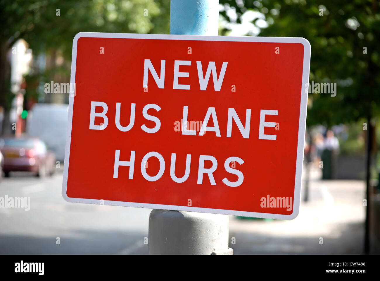 new bus lane hours sign in chiswick, london, england Stock Photo