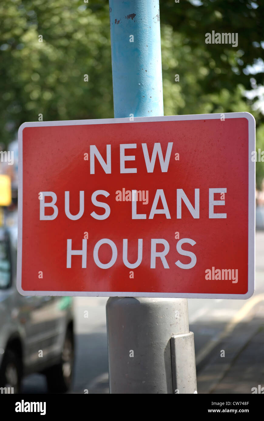new bus lane hours sign in chiswick, london, england Stock Photo