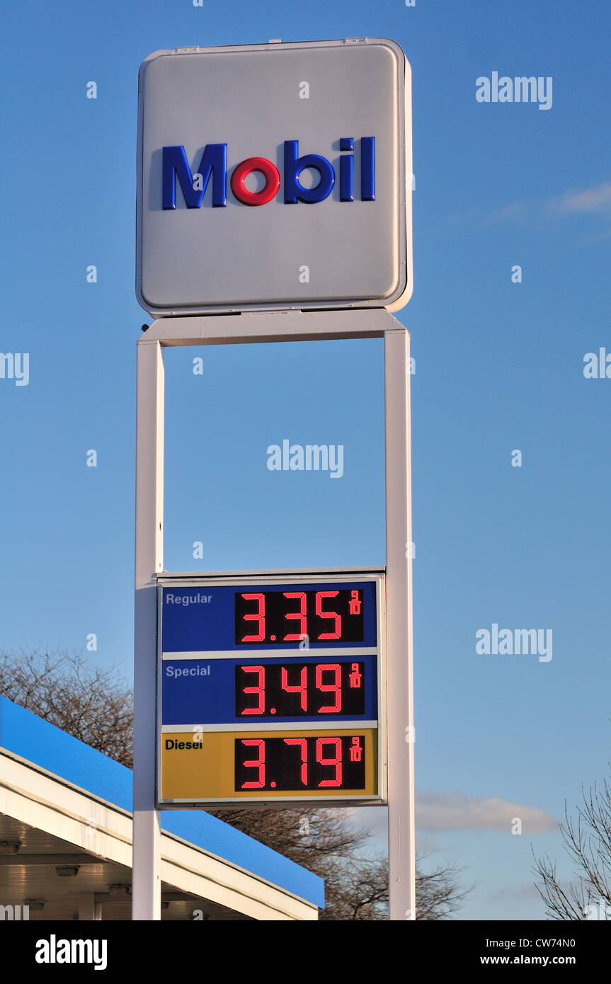 Northern Illinois service station gas prices on an easily changeable sign to accommodate the frequent changes to the price. Stock Photo