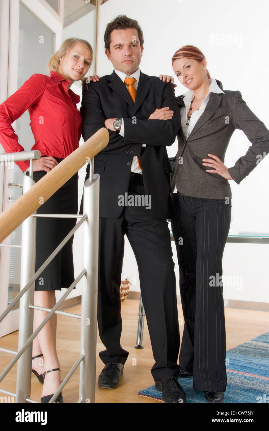 three young business people Stock Photo - Alamy