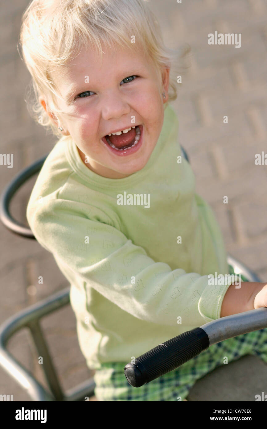 Kids on tricycle hires stock photography and images Alamy