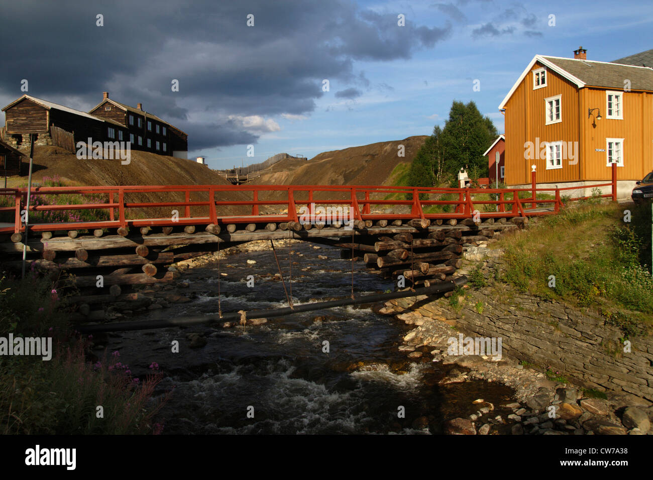 bridge over creek, ancient copper mill and slag heap, Norway, Roeros Stock Photo