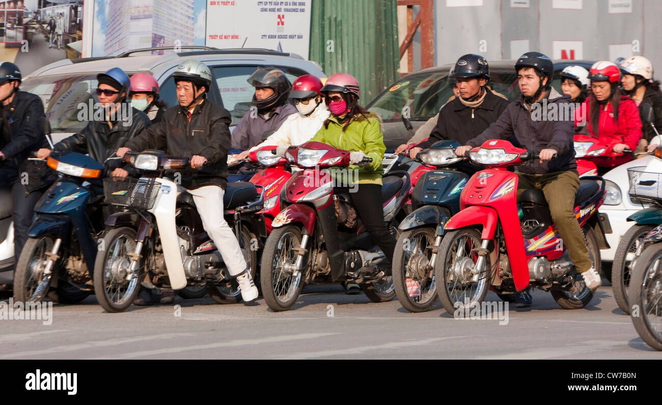 Vietnamese Motorcycle Rider Vietnamese people riding a motorcycle hi-res stock photography and ...