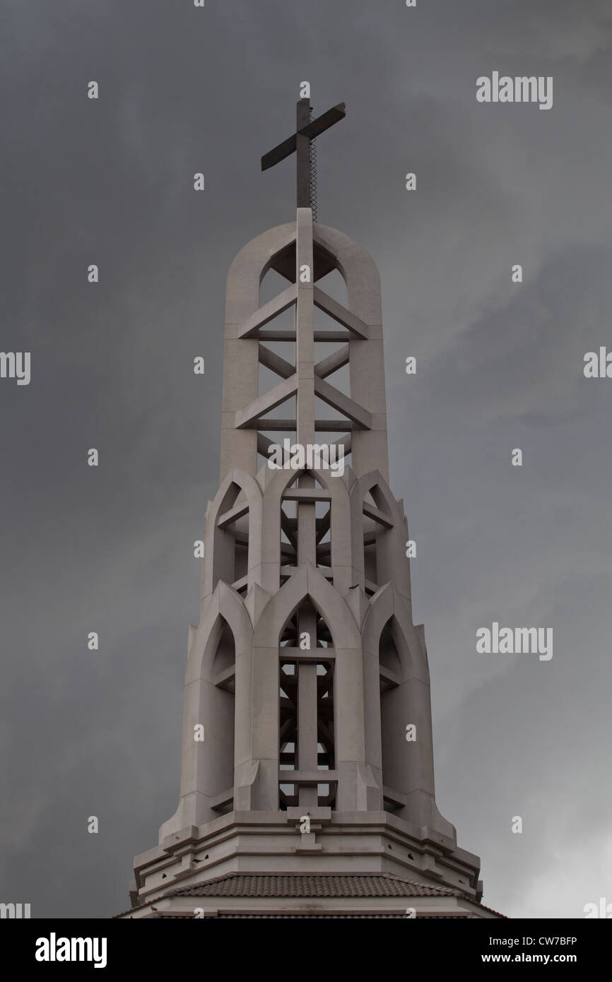 Cross on the top of church in darkness Stock Photo