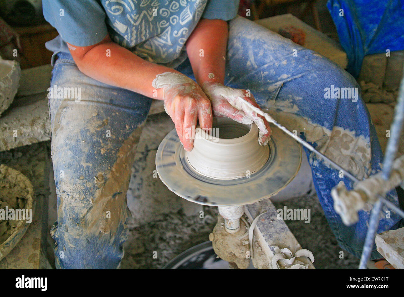 female ceramist at the pottery wheel Stock Photo