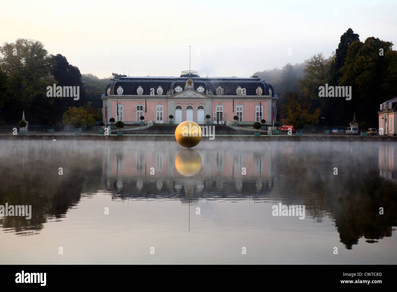 Benrath castle reflecting in a pond with golden bowl, Germany, North Rhine-Westphalia, Duesseldorf Stock Photo