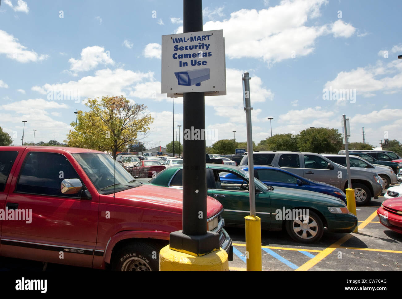 Sign in parking lot of Wal-Mart store in San Marcos, Texas indicating the use of video surveillance. Stock Photo