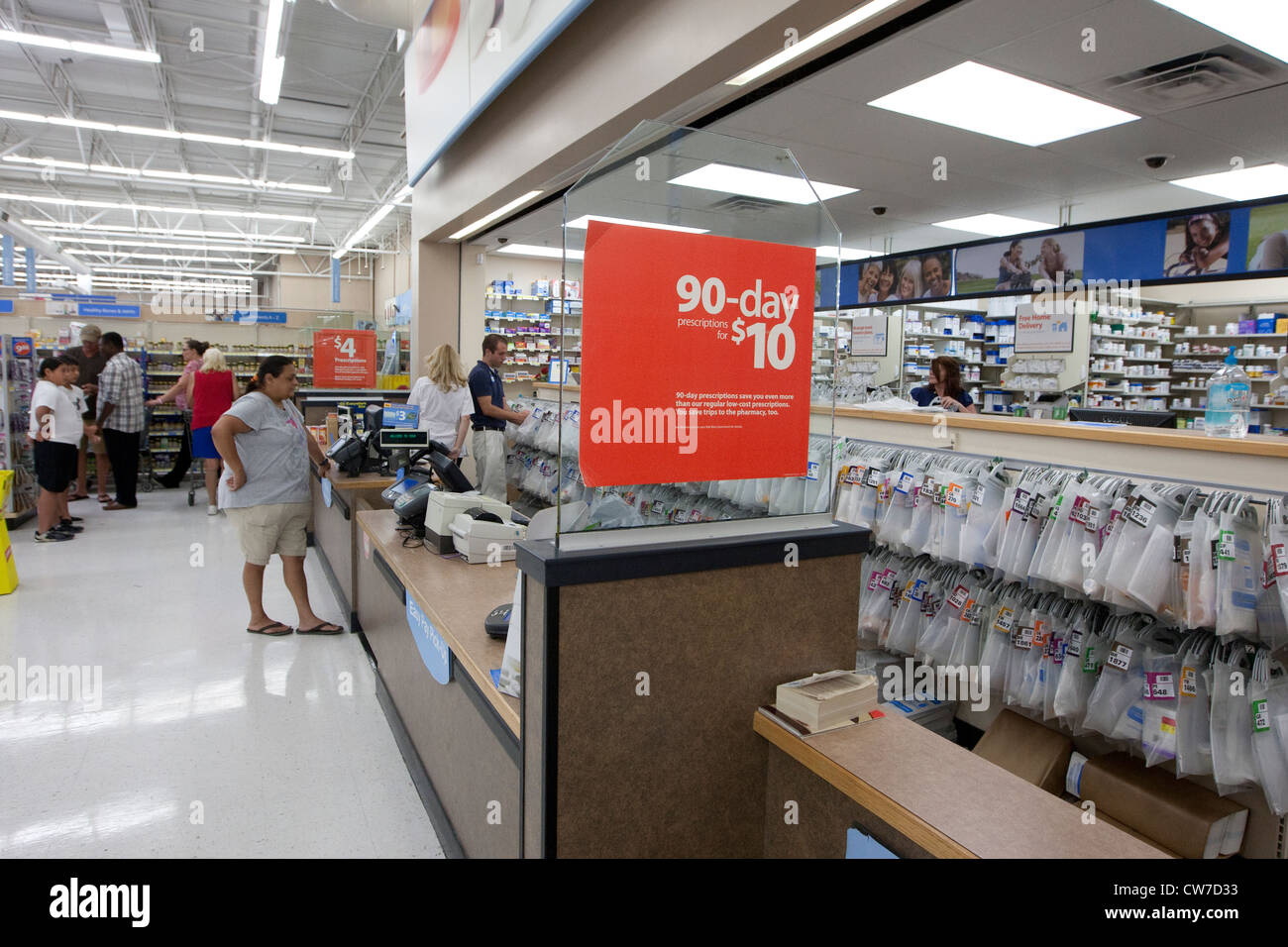Sign advertising low cost medicine prescriptions at a Wal-Mart Supercenter pharmacy in San Marcos, Texas Stock Photo