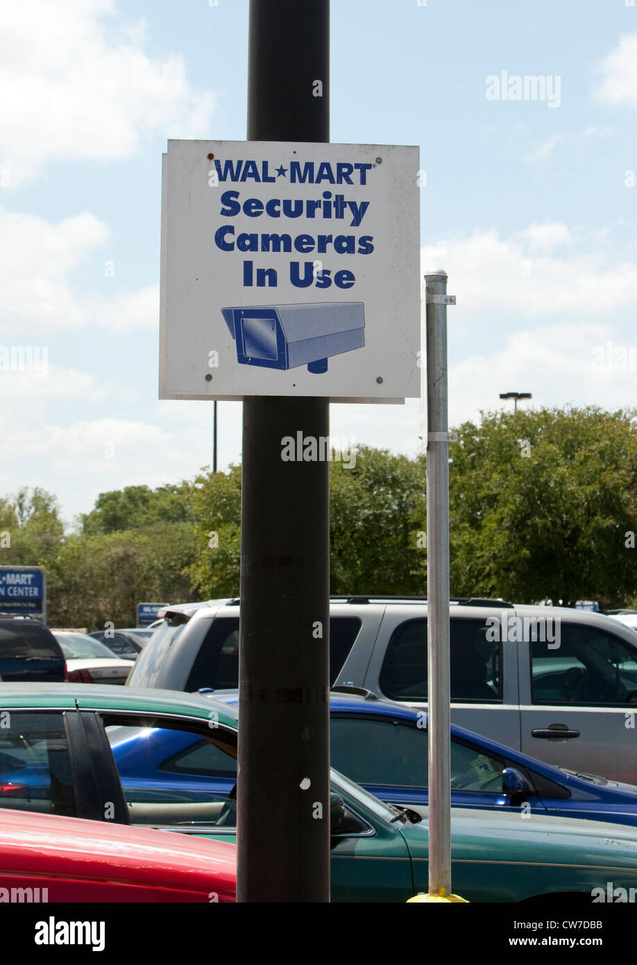 Sign in parking lot of Wal-Mart store in San Marcos, Texas indicating the use of video surveillance. Stock Photo