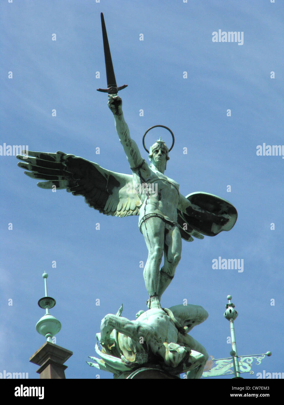 Bronze sculpture on city hall of Hamburg: Archangel Michael defeats Satan/the evil with his sword, Germany, Hamburg Stock Photo