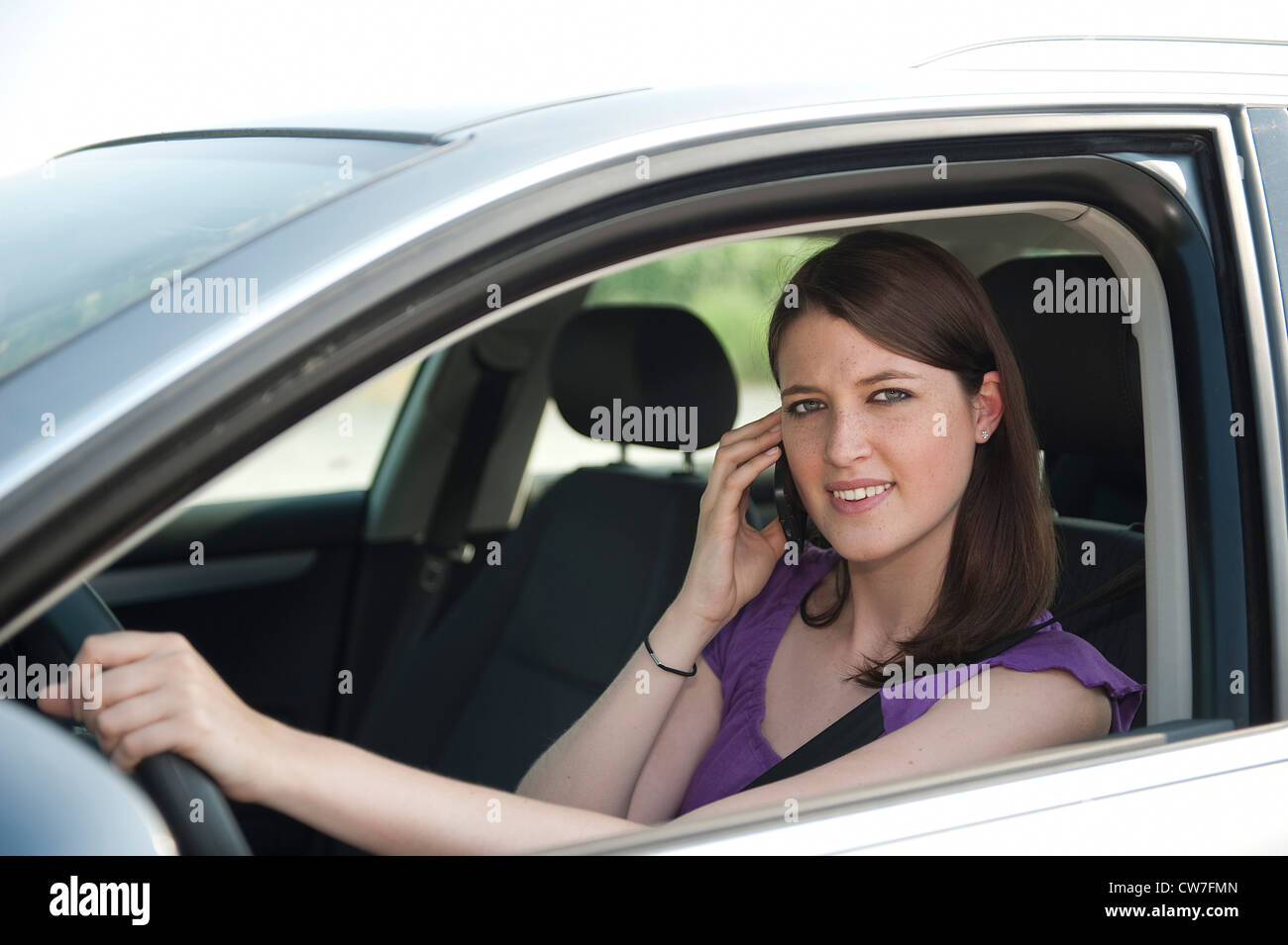 Young woman sits in drivers hires stock photography and images Alamy