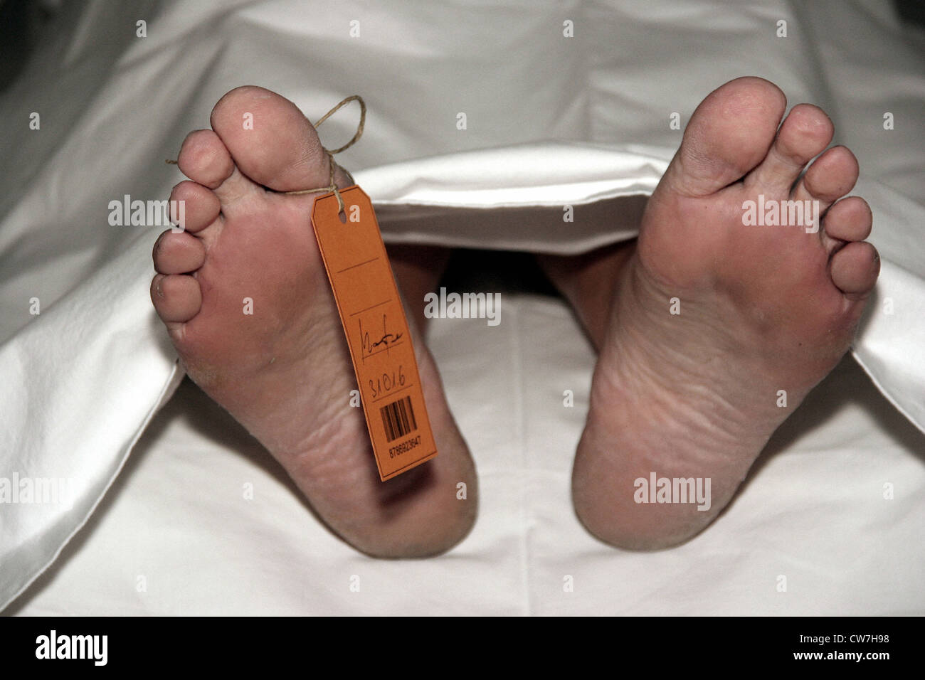dead body under a sheet Stock Photo