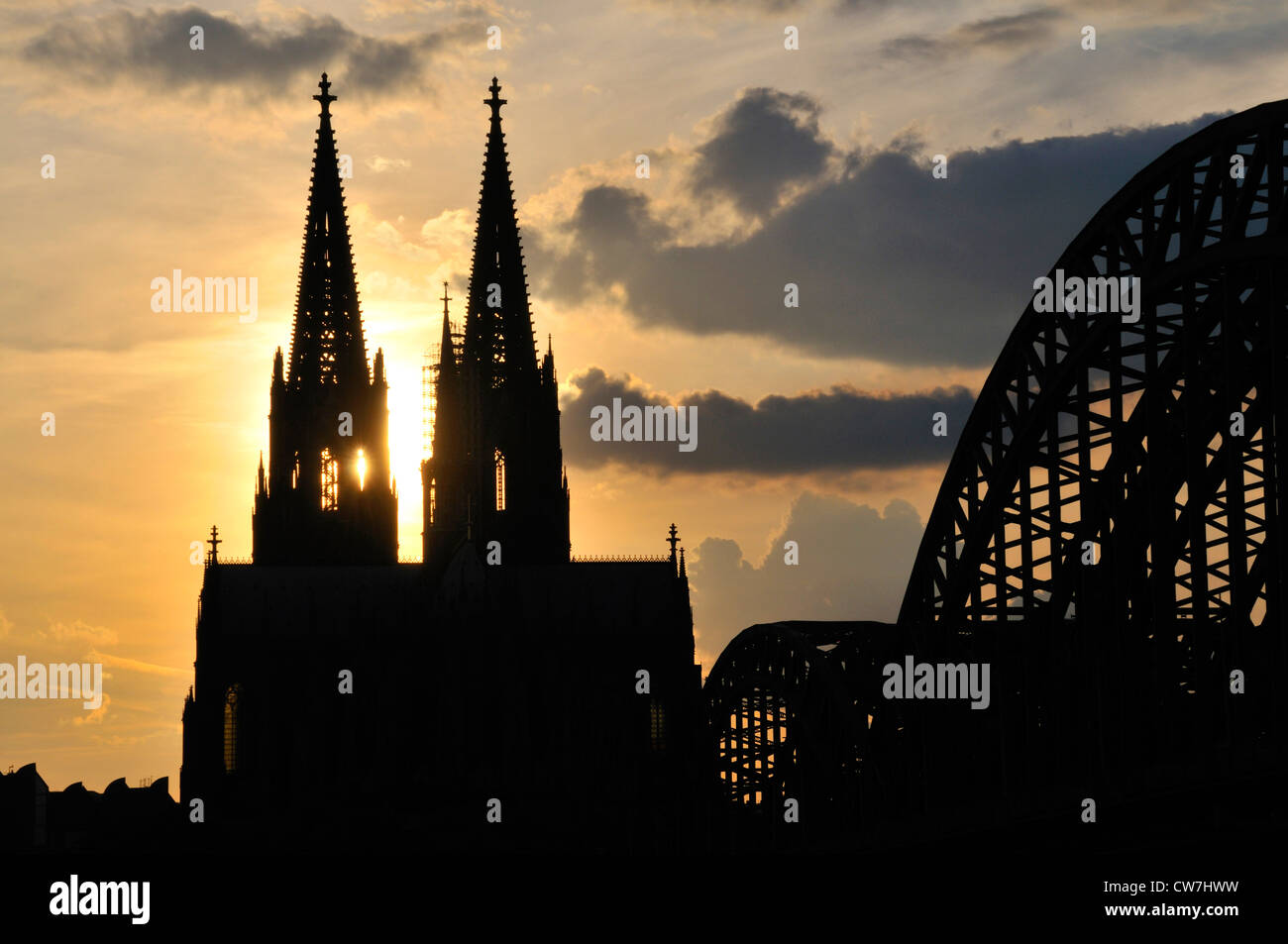 Cologne cathedral in the evening with Hohenzollern bridge, Hohenzollernbruecke, Germany, North Rhine-Westphalia, Cologne Stock Photo