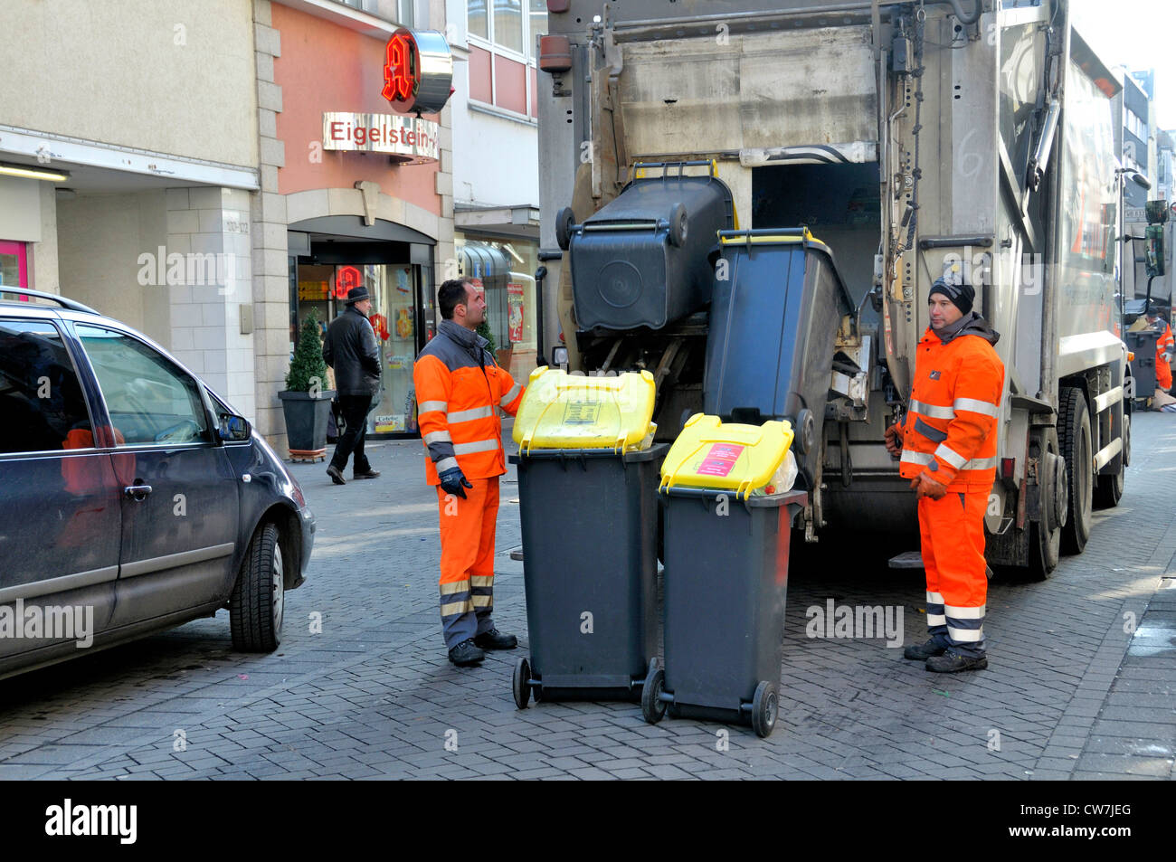 refuse collection service clearing garbage bins, Germany, North Rhine