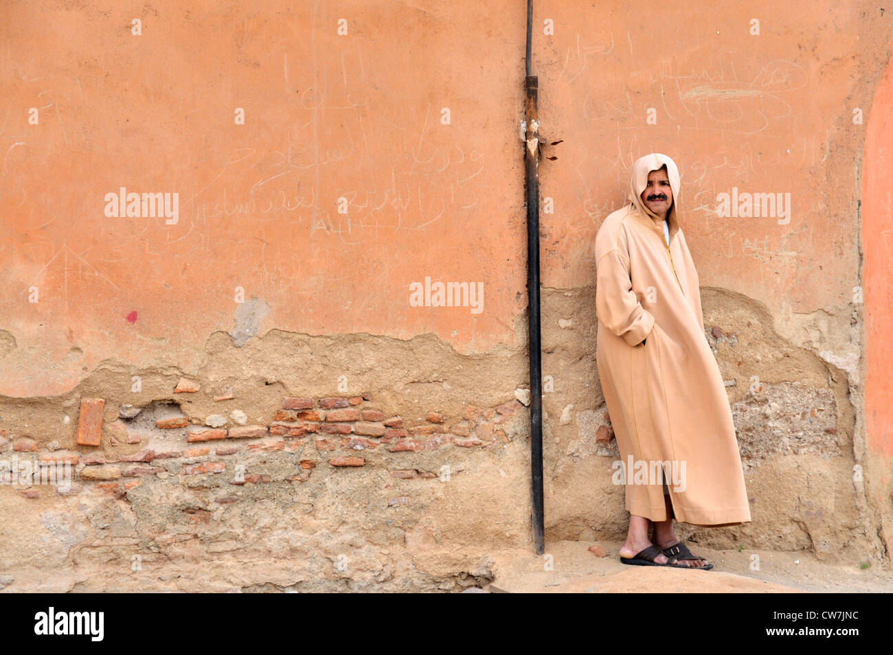 man wearing traditonal djellabah, Morocco, Marrakesh Stock Photo