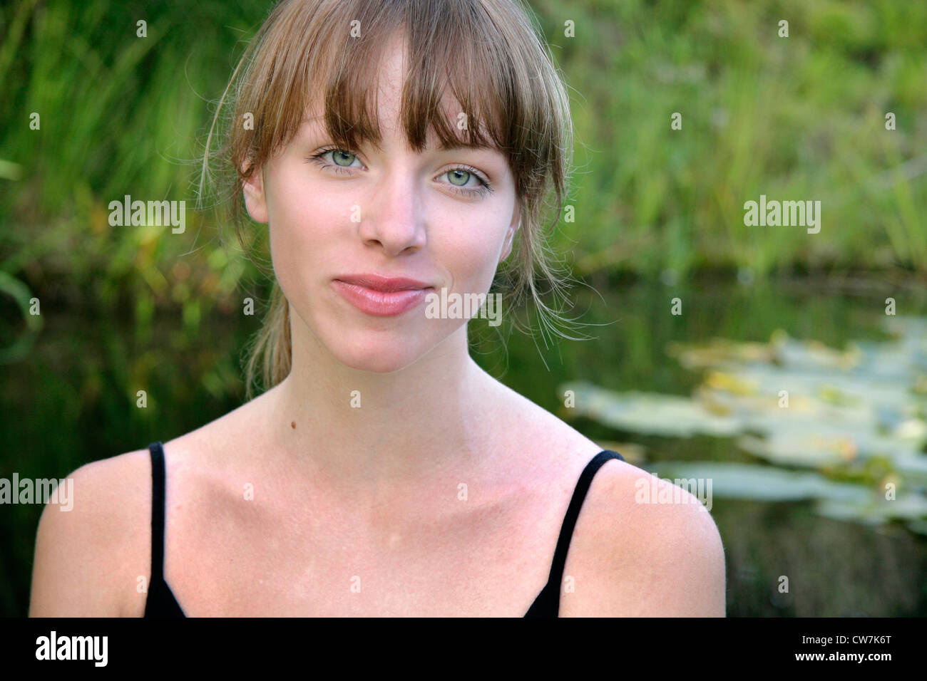 cute young woman with grey eyes Stock Photo, Royalty Free Image ...